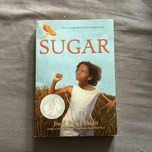 Sugar:Jewel Parker Rhodes, bend in cover of book, pages are perfect condition.